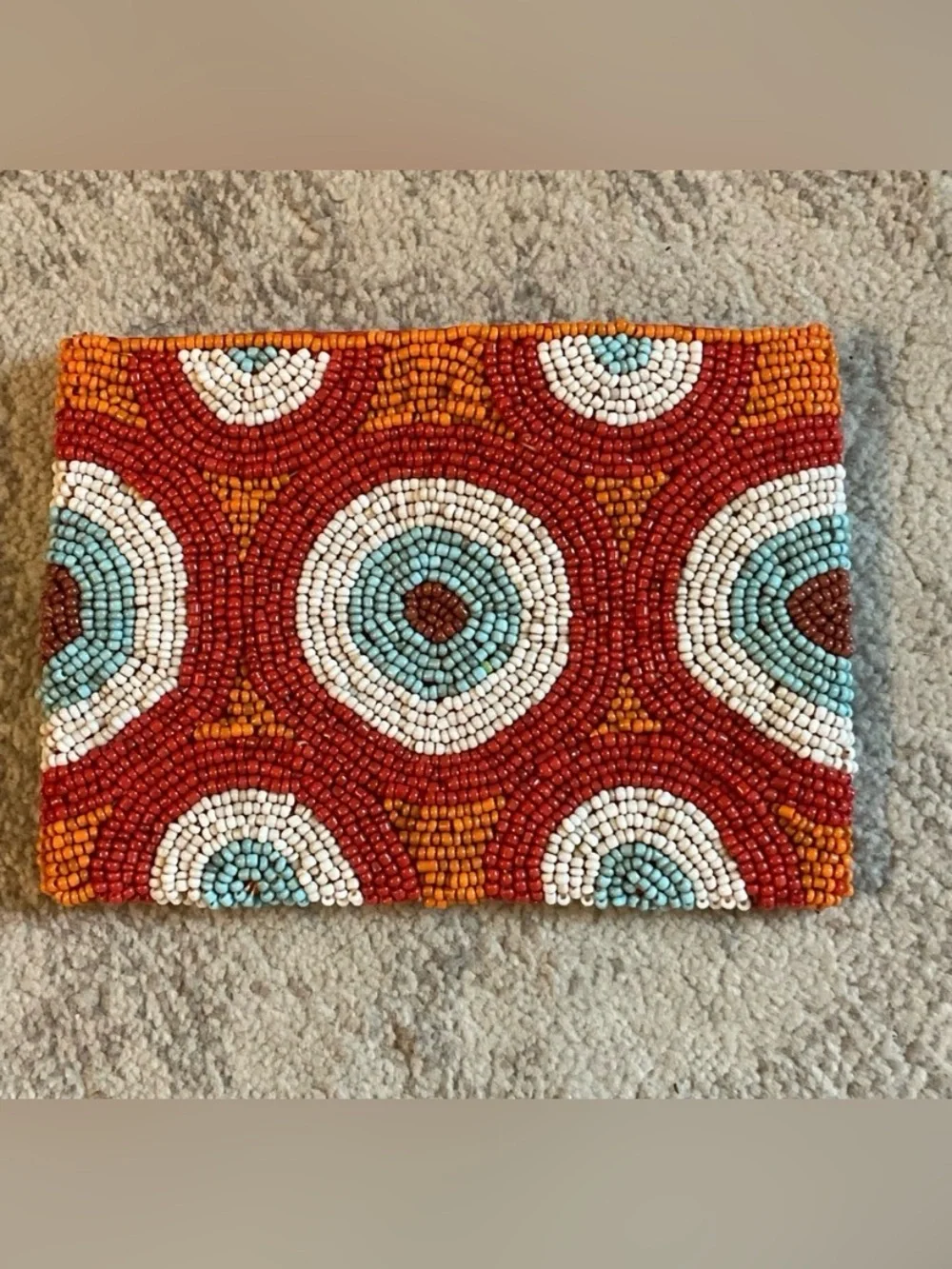 Small hand beaded clutch